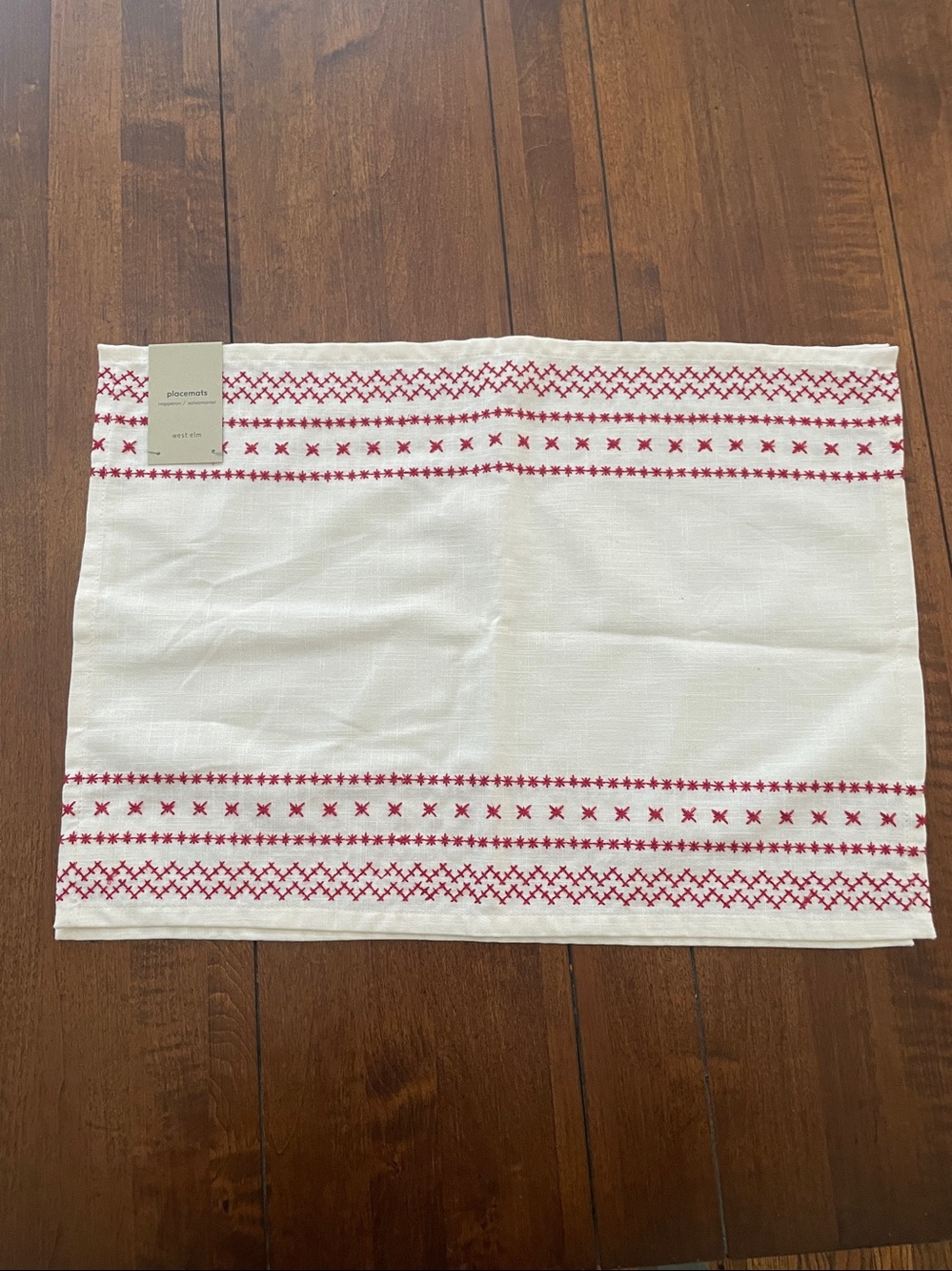 NWT West Elm Embroidered Cream Placemat with Red Cross-Stitch Trim
